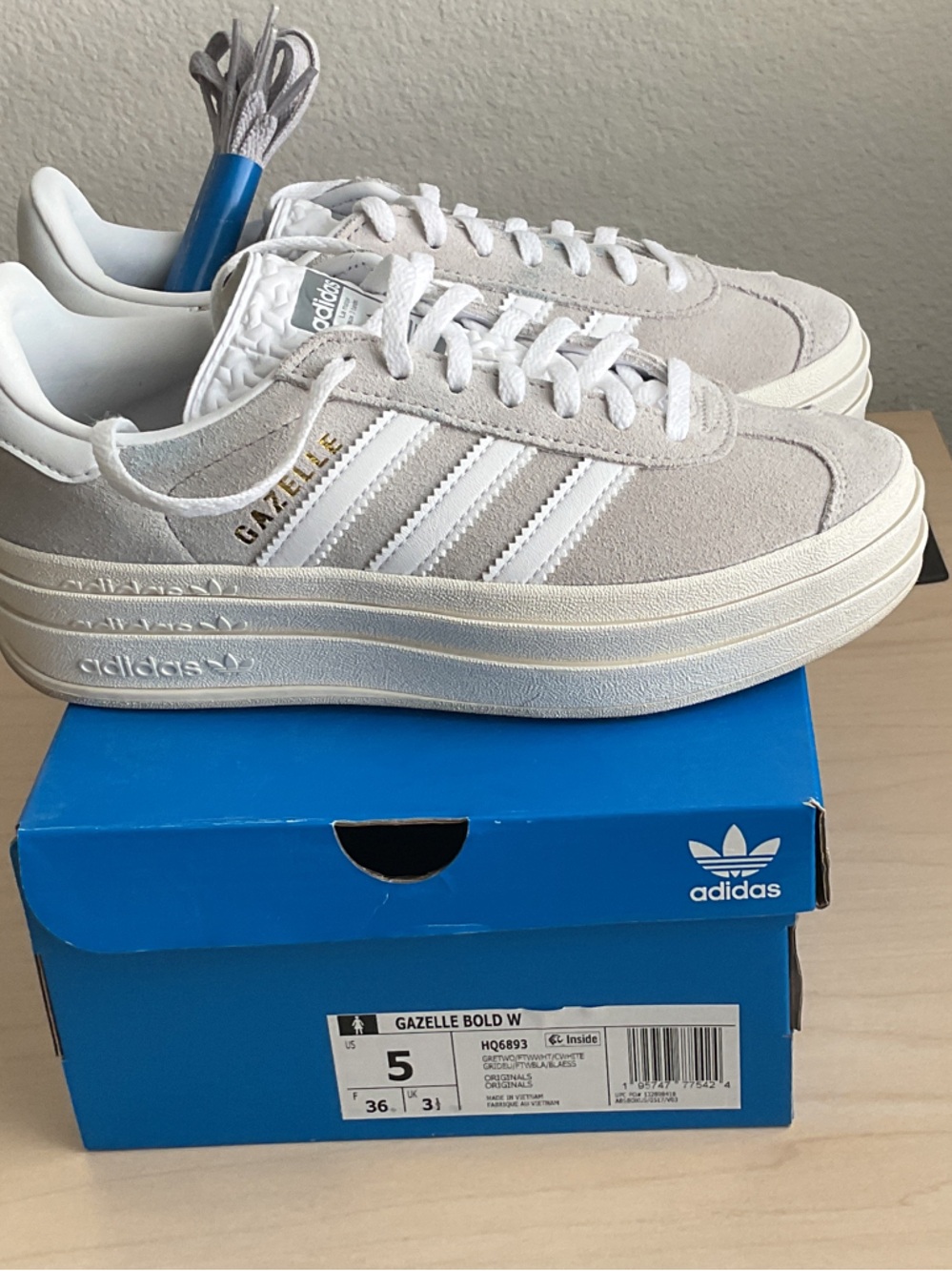 adidas Gazelle Sneakers in Light Gray & White with Gold Accents